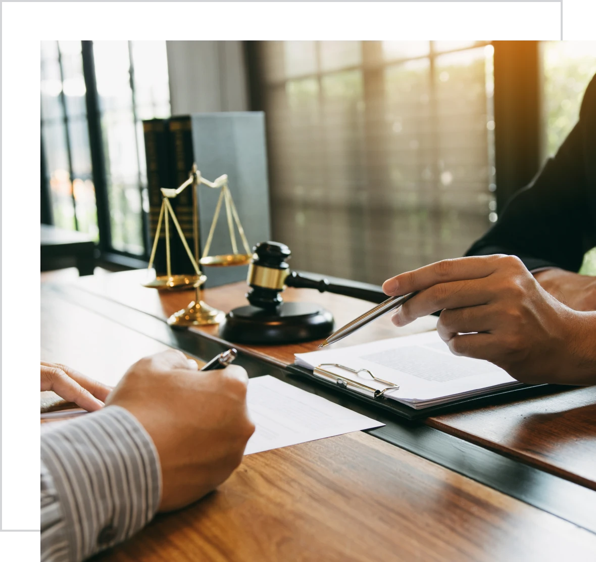 Gavel and scales on lawyer's desk